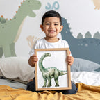Child holding a framed picture of a dinosaur in a room with dinosaur-themed decor.